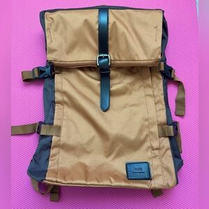 Muta Tan and Black Backpack